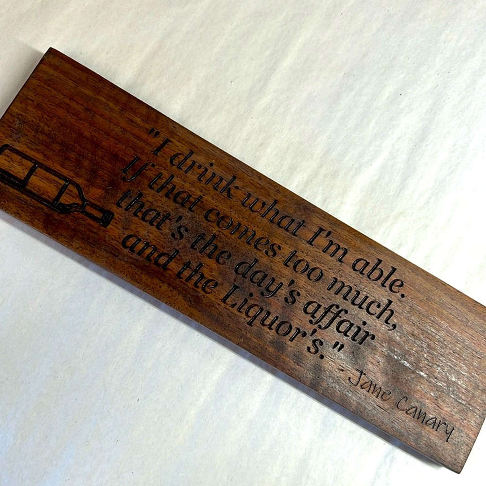 W9 - Brand new, solid, walnut, sign with quotation from calamity Jane
